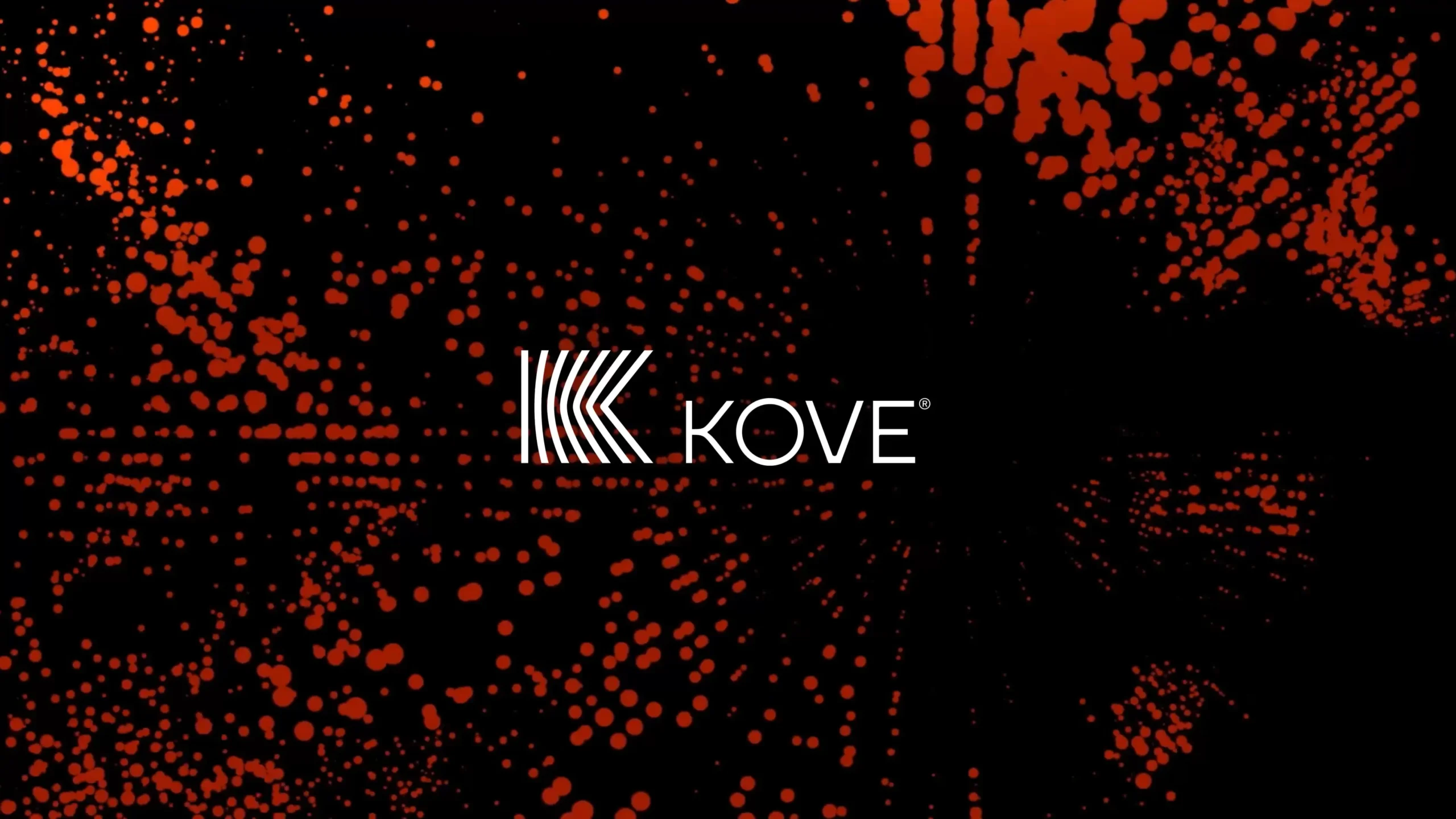 Kove logo on a black background with red abstract dots.