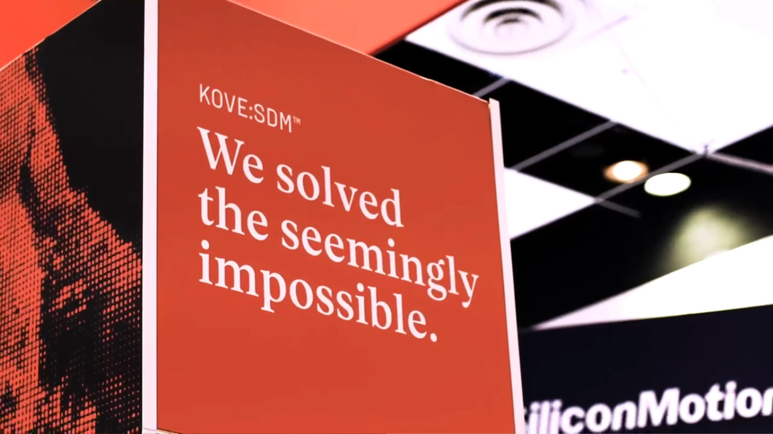 Kove:SDM™ booth sign: "We solved the seemingly impossible.