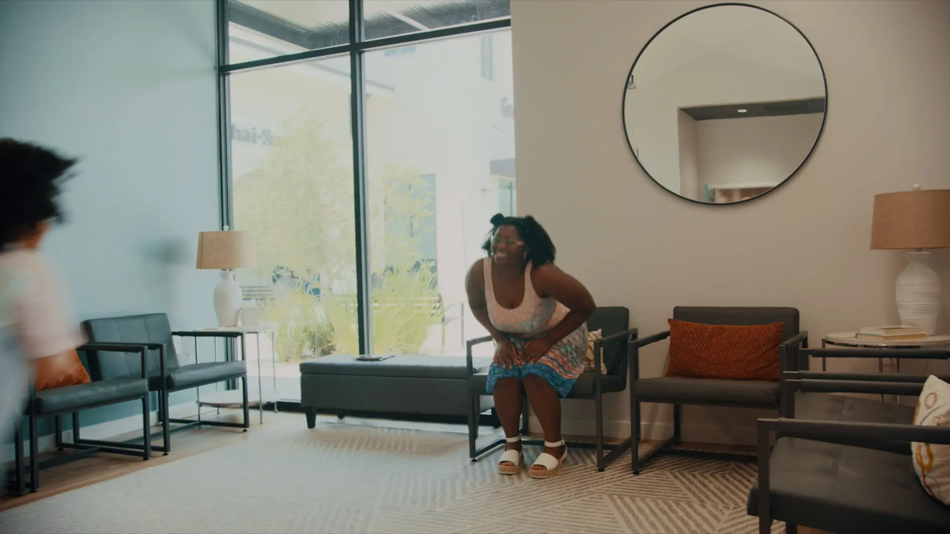 Woman in waiting room, possibly for brain balance assessment.