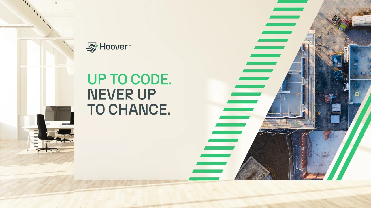 Hoover brand ad featuring a modern office and construction site. Text: "Up to code. Never up to chance.