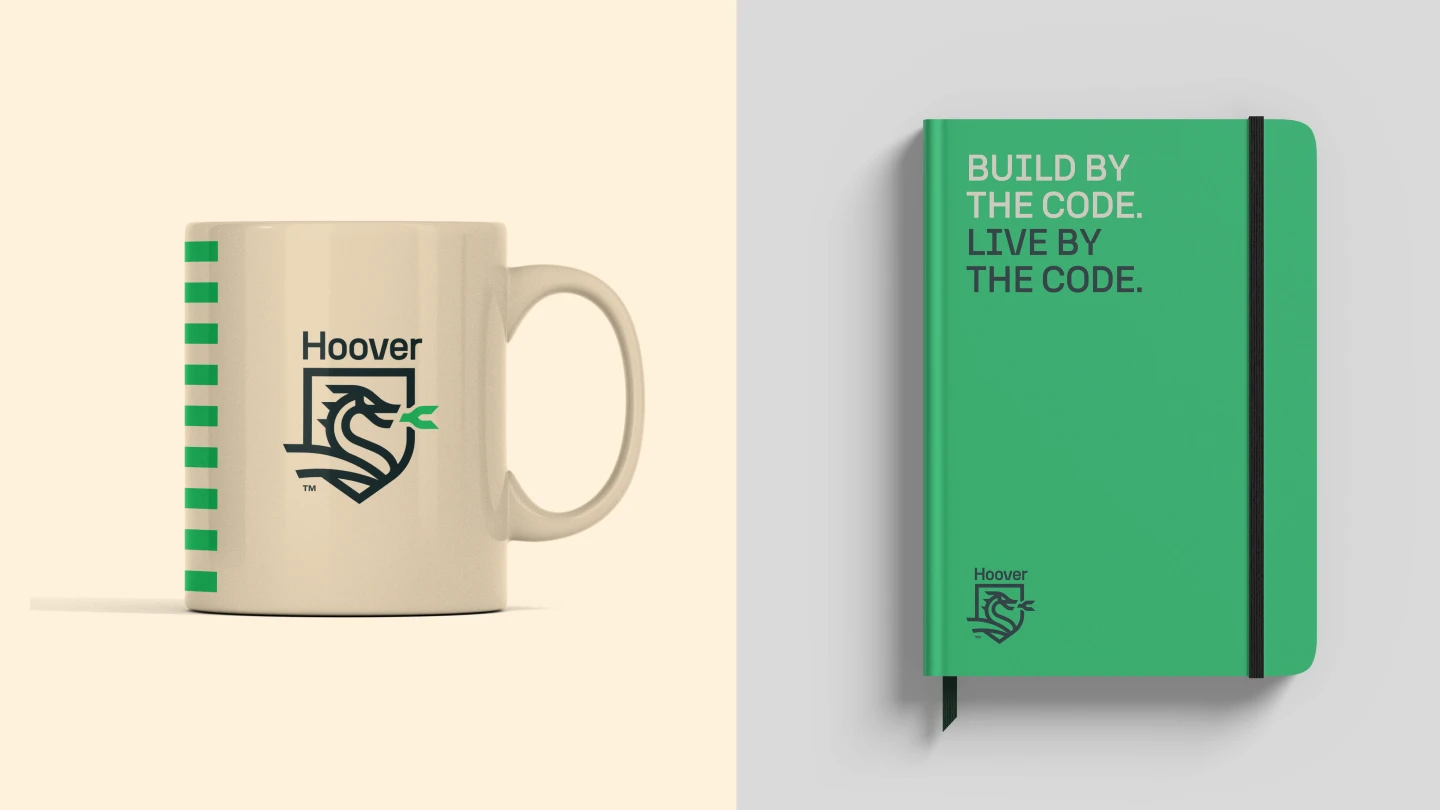 Hoover branded mug and notebook. "Build by the code, live by the code.